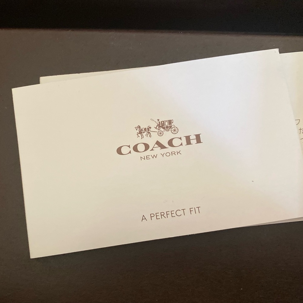 New in box Coach wristlet.